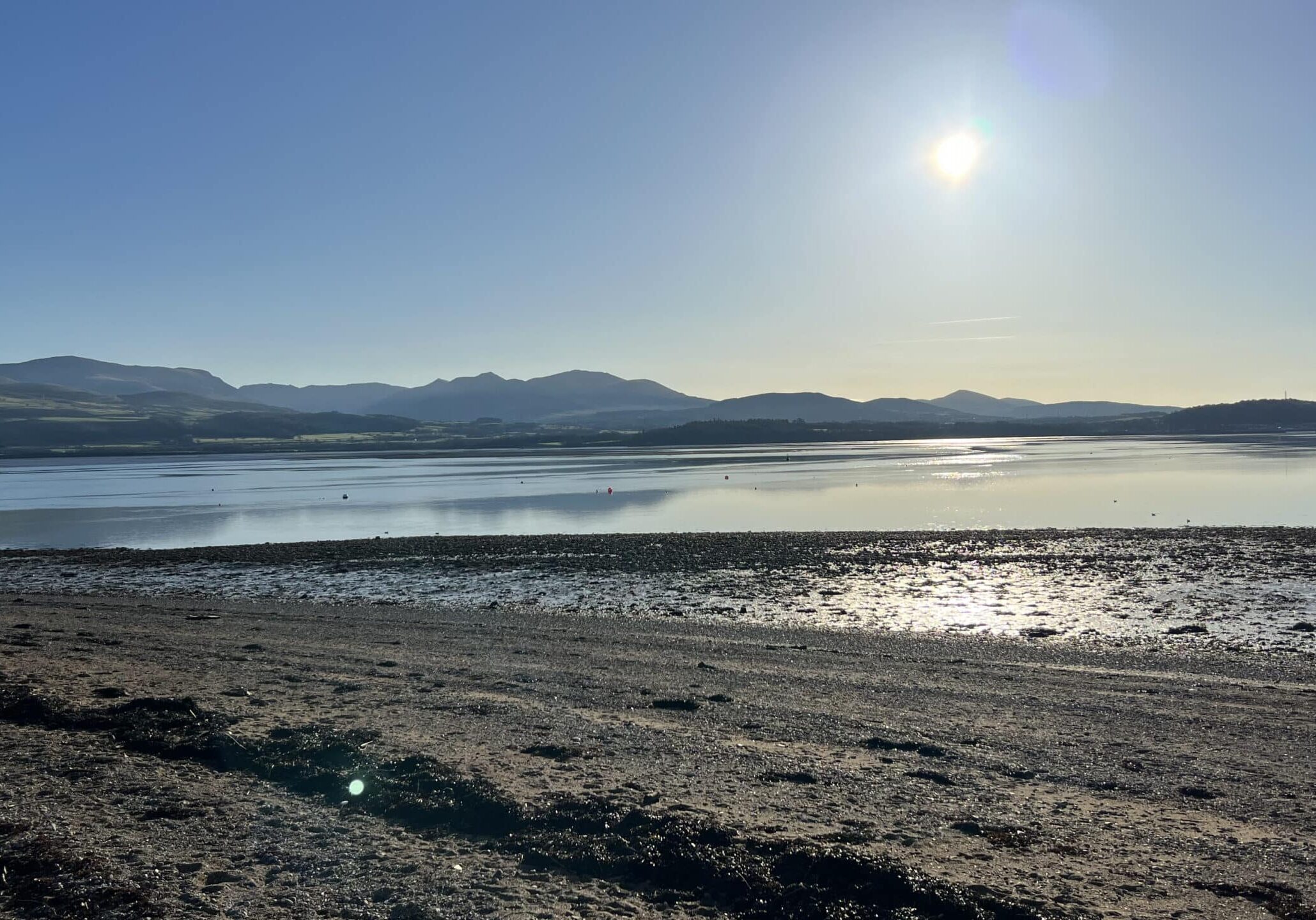 The beach at Beaumaris, looking towards Snowdon (photo: Laurence Perkins)